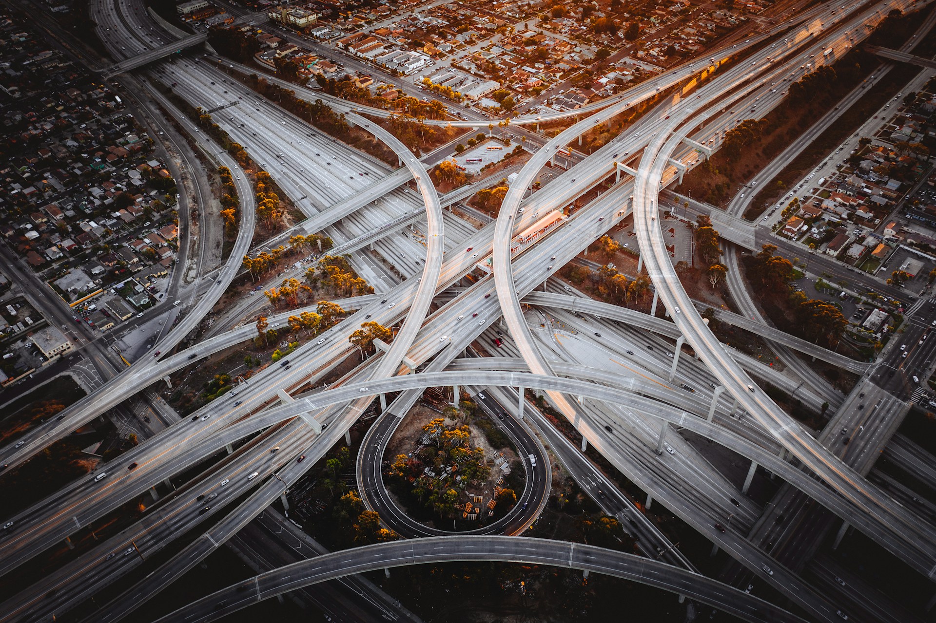 Aerial view of a complex highway interchange representing the interconnected nature of AI project prioritization and portfolio management in enterprise organizations.